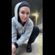 Miss Marilyn poses in a parking garage in a grey hoodie and black pants, squats, and shows her ass. No pooping shown. Presented in 720P vertical HD format. Over a minute.